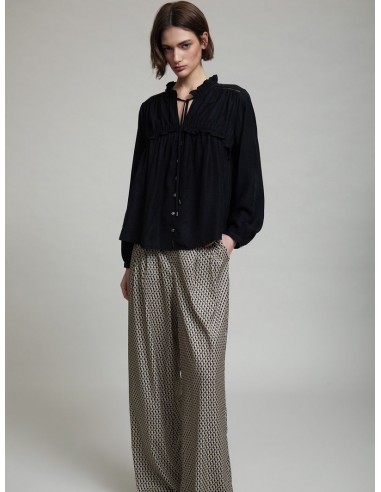 BLUSA FLUIDA CON VOLANTE