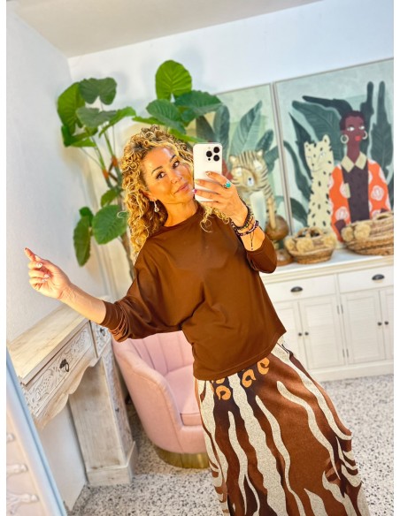 TOP BROWN LEAKE